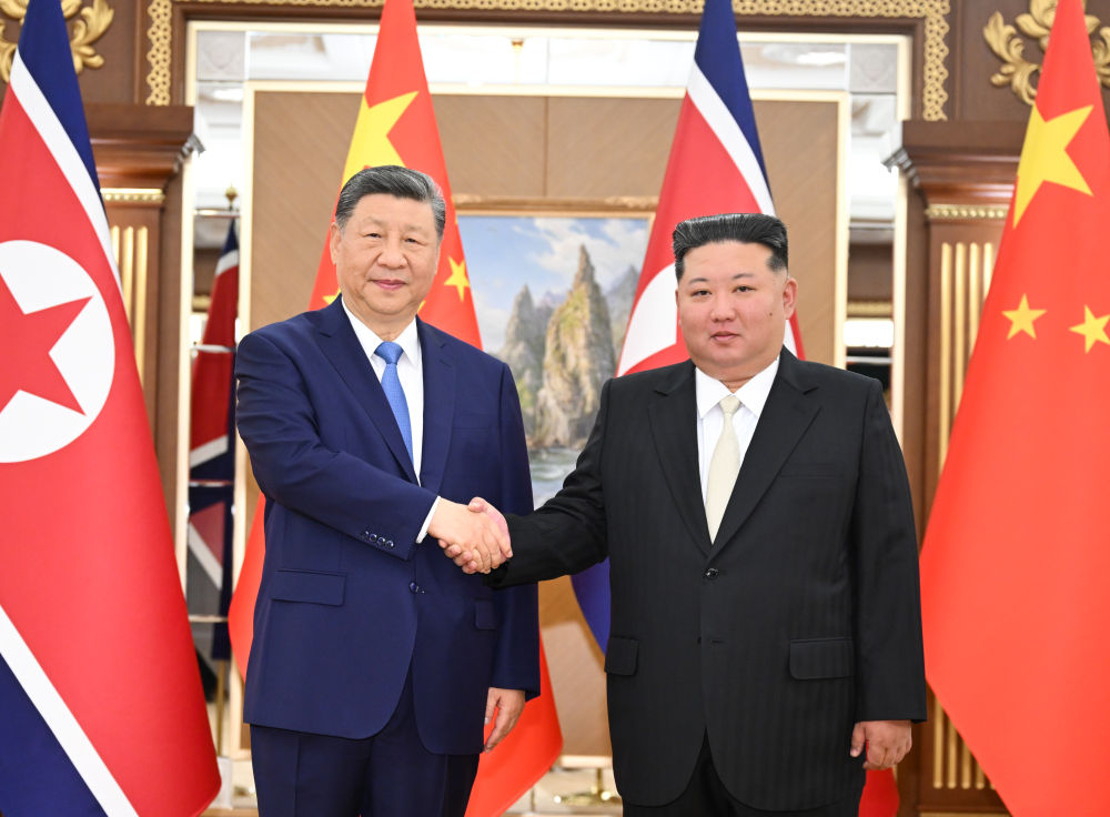 Xi Jinping Holds Talks with Kim Jong Un on Strengthening China-DPRK Relations