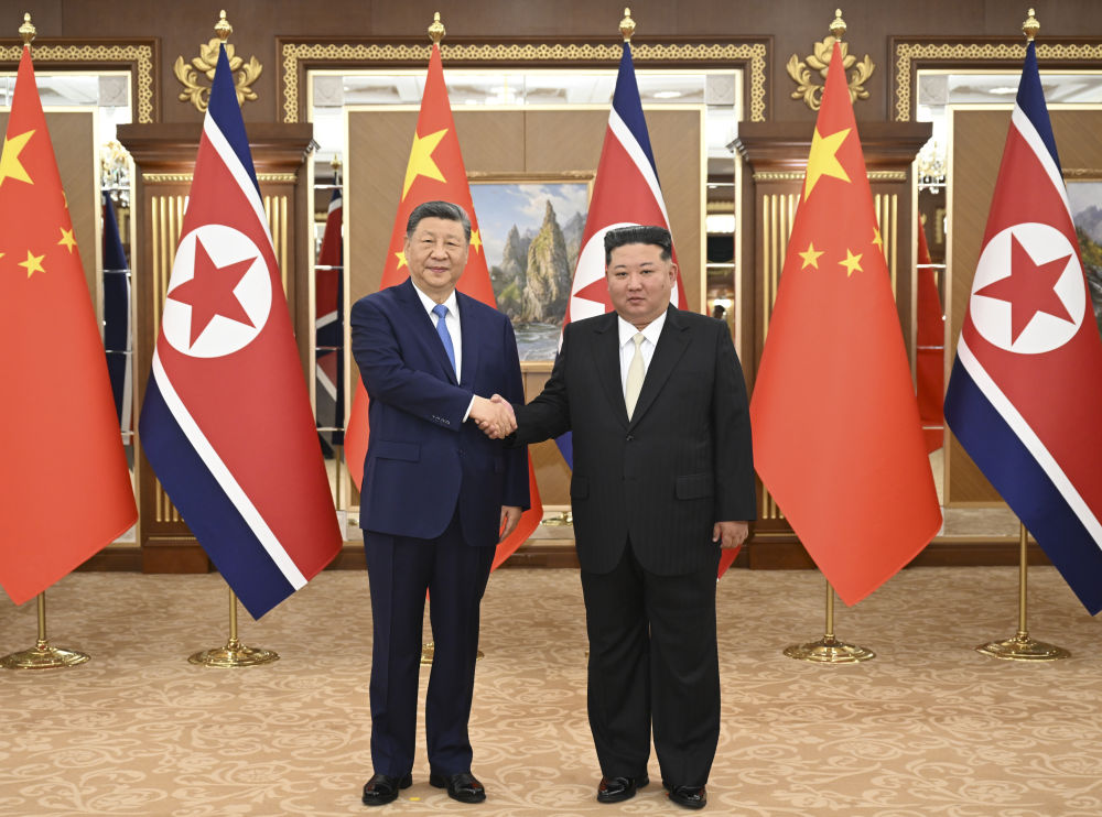 Xi Jinping Holds Talks with Kim Jong Un on Strengthening China-DPRK Relations
