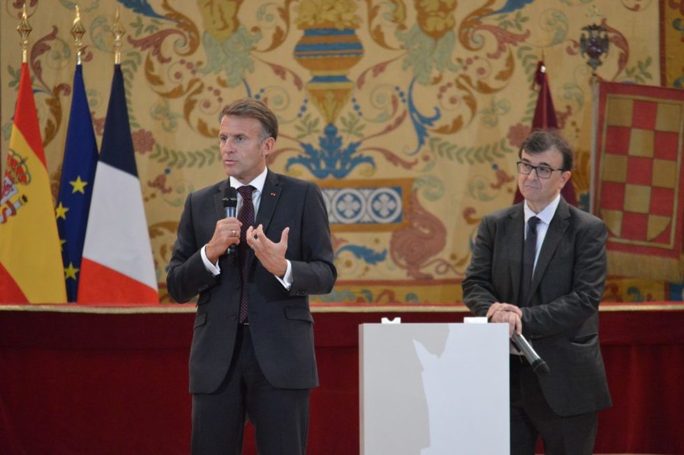 Macron Calls for Action to Restore Democracy Amidst Global Crisis