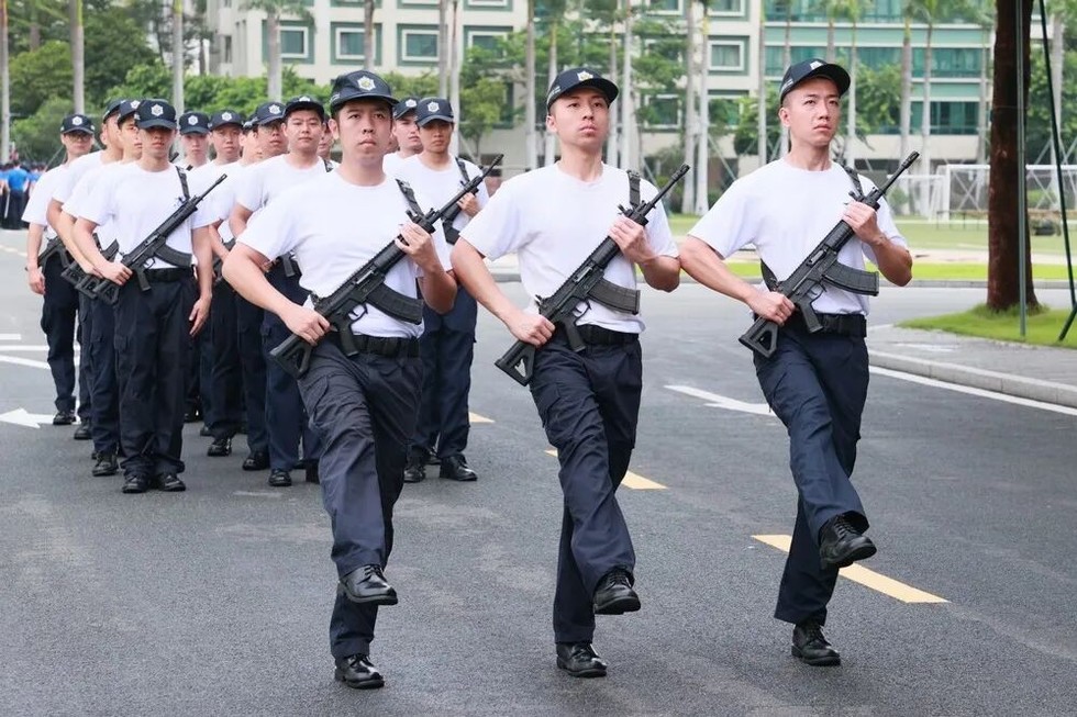 Macao Security Forces Adopt Chinese-Style Military Drills for National Day Flag-Raising Ceremony