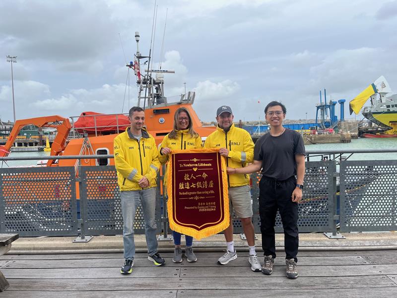 Chinese Student Presents Golden Flag of Gratitude to RNLI Rescue Team